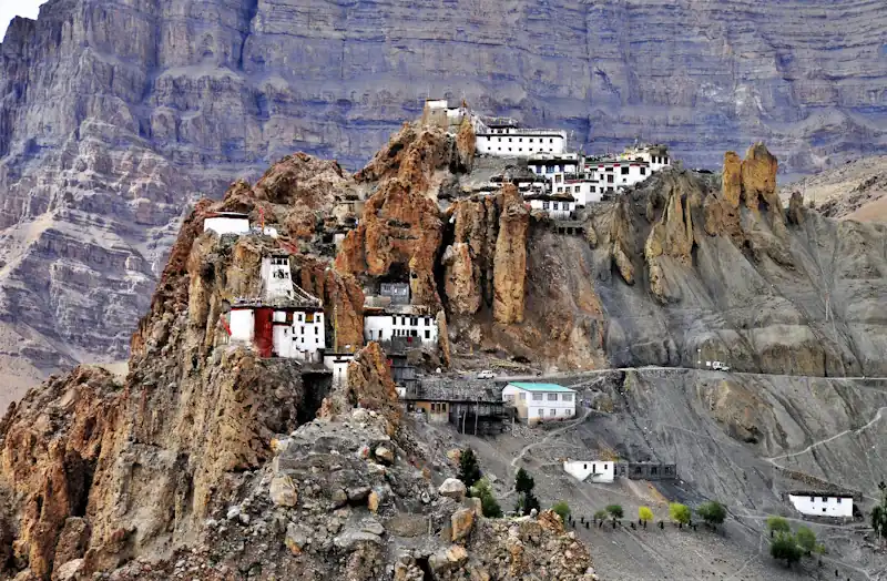 A monastery-style building on a rocky mountain in Spiti.